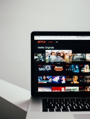 Immerse yourself in original language version movies on Netflix to learn a language fast.
